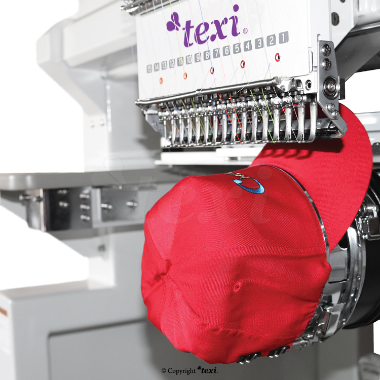 Industrial, six-head, twelve-needle embroidery machine with an enlarged field of work